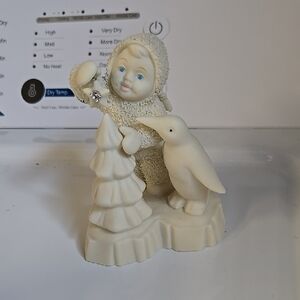 Department 56 Cream and White Figurine with Child and Penguin